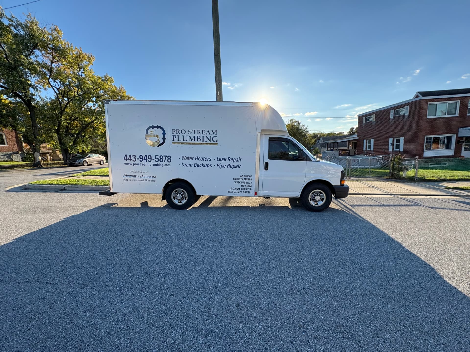 ProStream Plumbing service truck parked on a residential street in Baltimore, MD — ProStream Plumbing