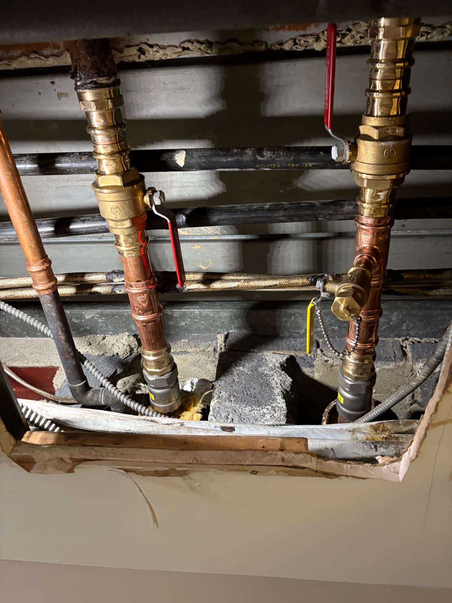 New copper water piping replacing corroded galvanized pipes in a ceiling in Baltimore, MD — ProStream Plumbing