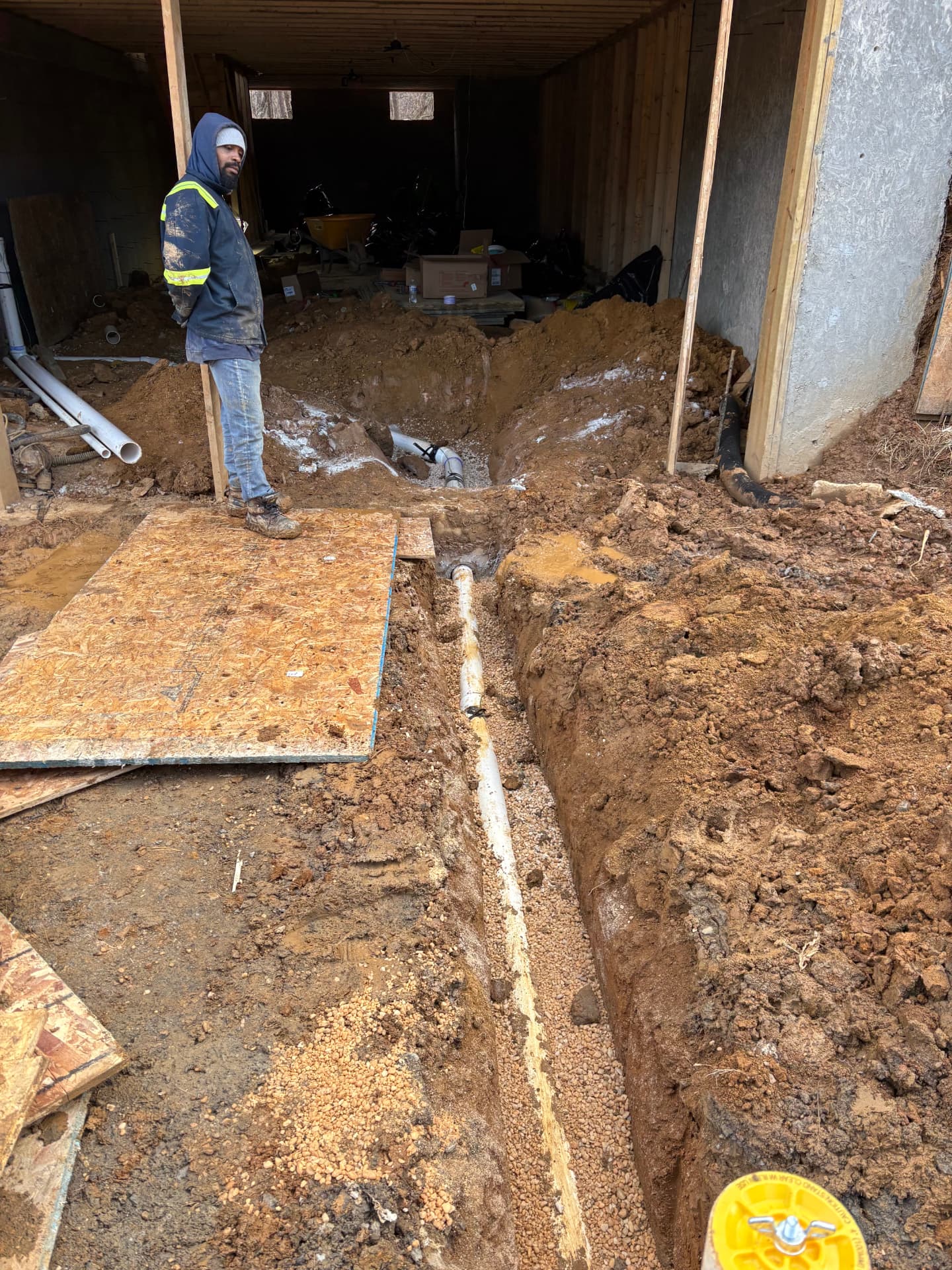 New PVC sewer main run bedded in an open trench in Baltimore, MD — ProStream Plumbing